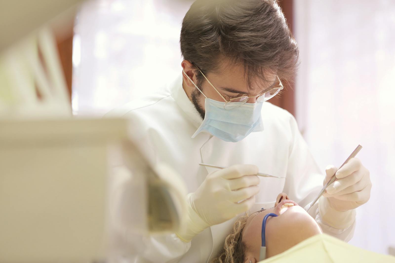 Dentist and assistant discussing treatment planning